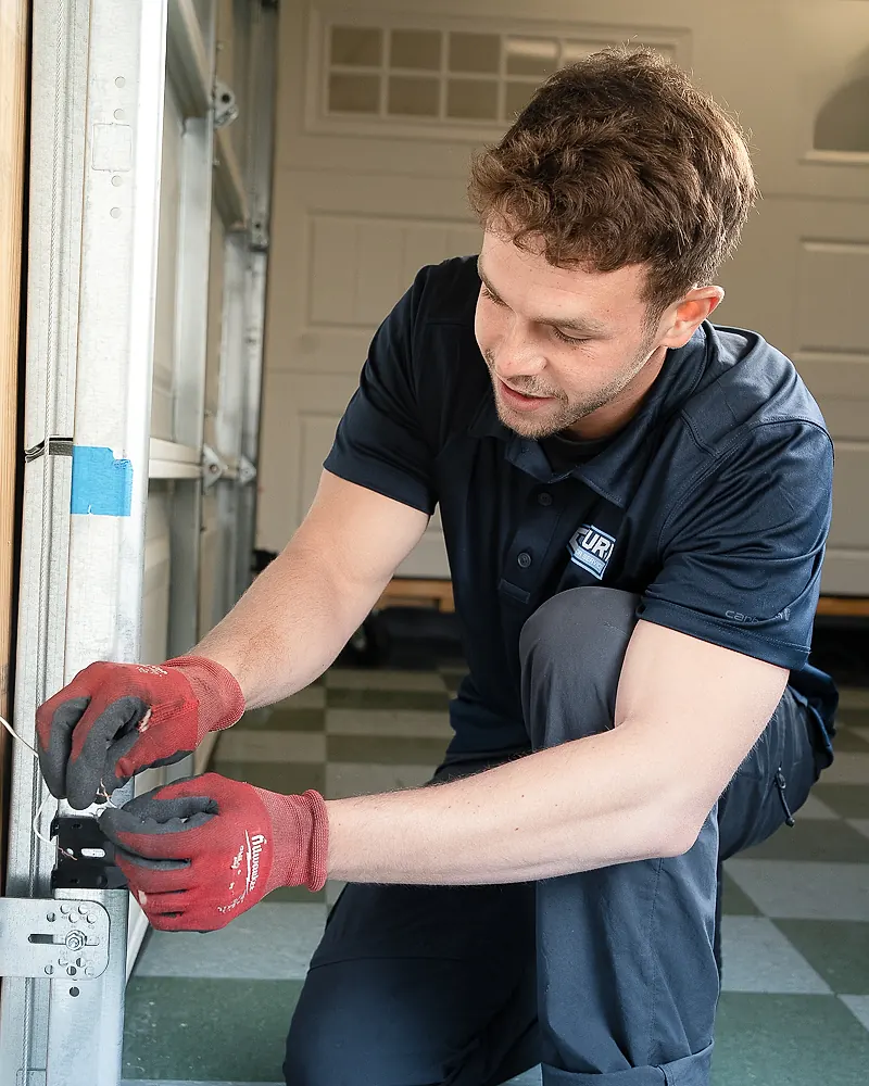 Garage door lift cable and drum being reseated