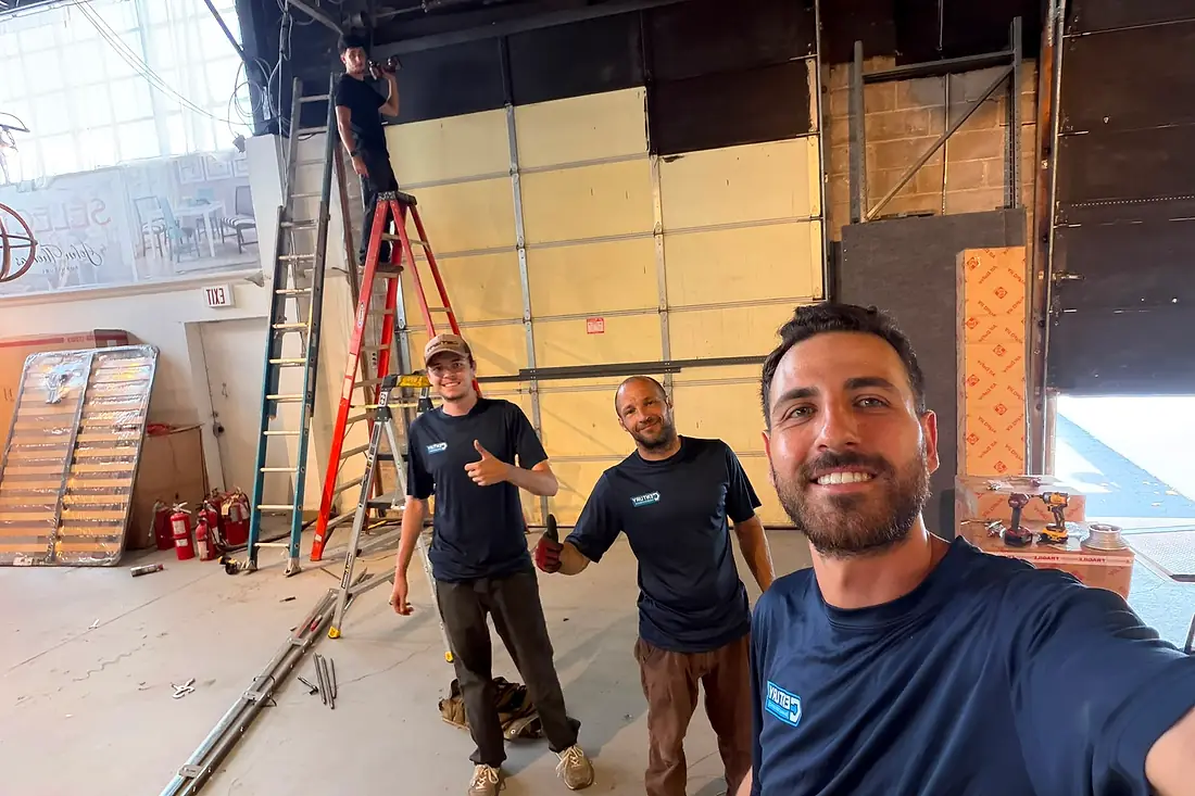 Century Garage Door team on a commercial repair job